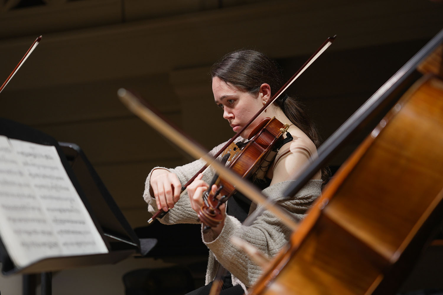 A violinist performing in the Performance Hall