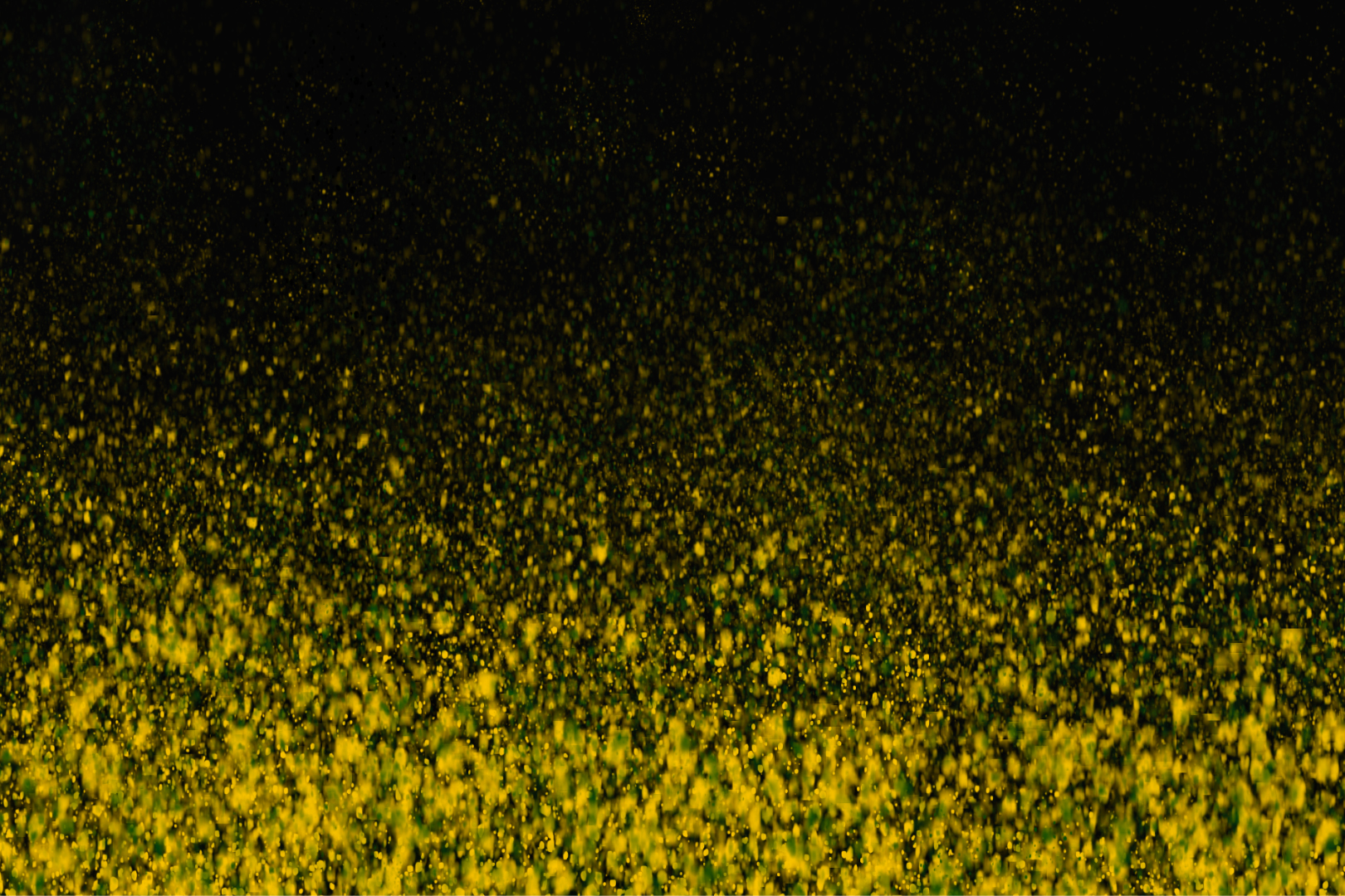 An abstract yellow and black splattered image