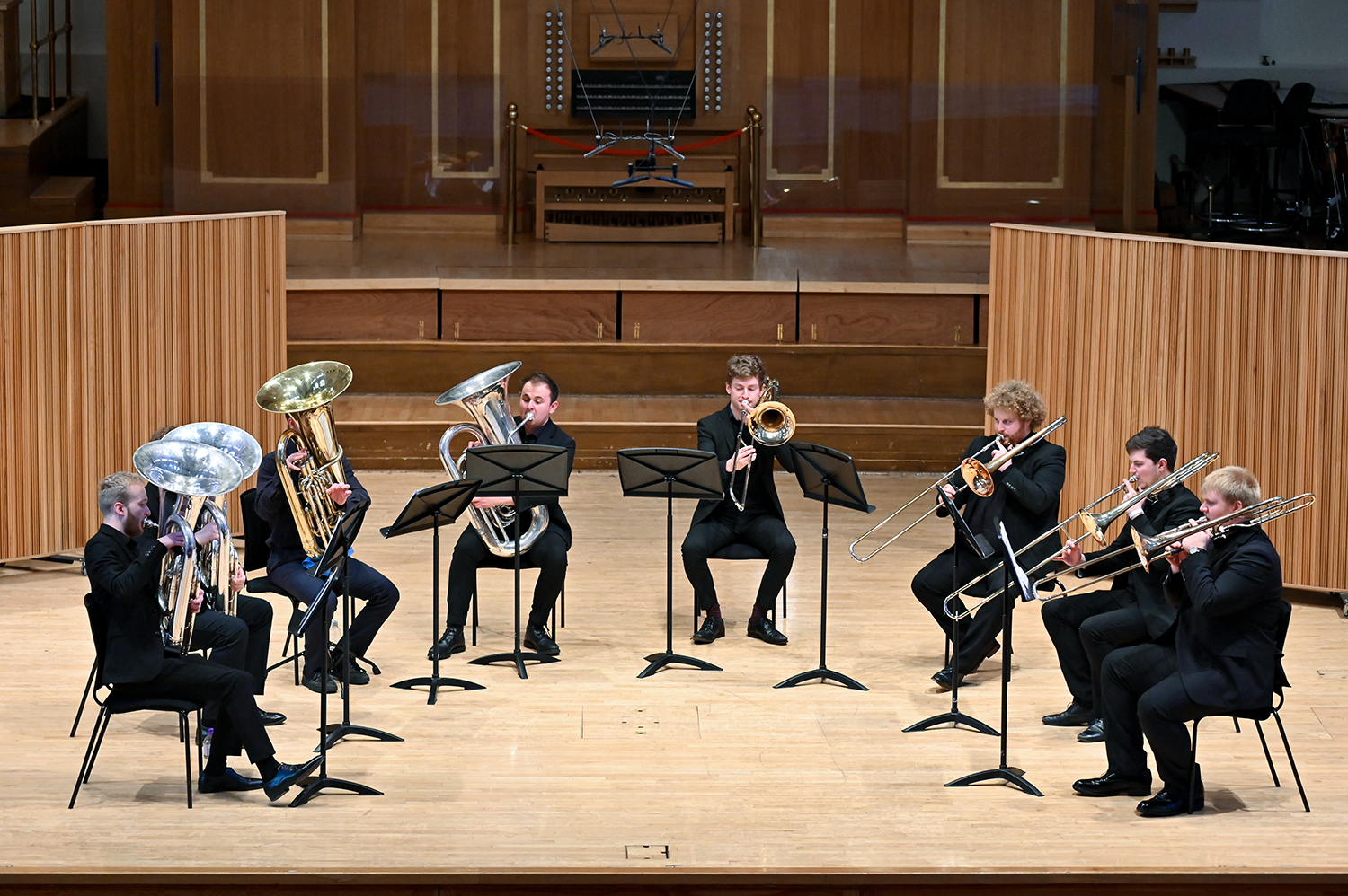 Brass musicians performing on the Amaryllis Fleming Concert Hall stage